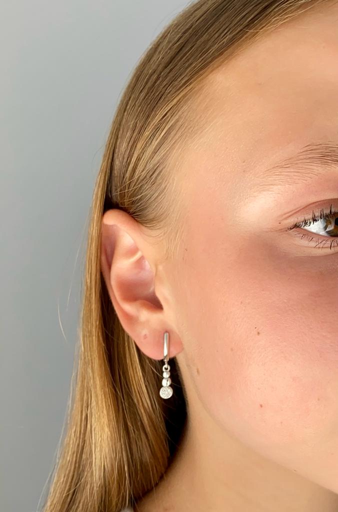 Náušnice z bílého zlata,  visací kolečka se zirkony 2,00g