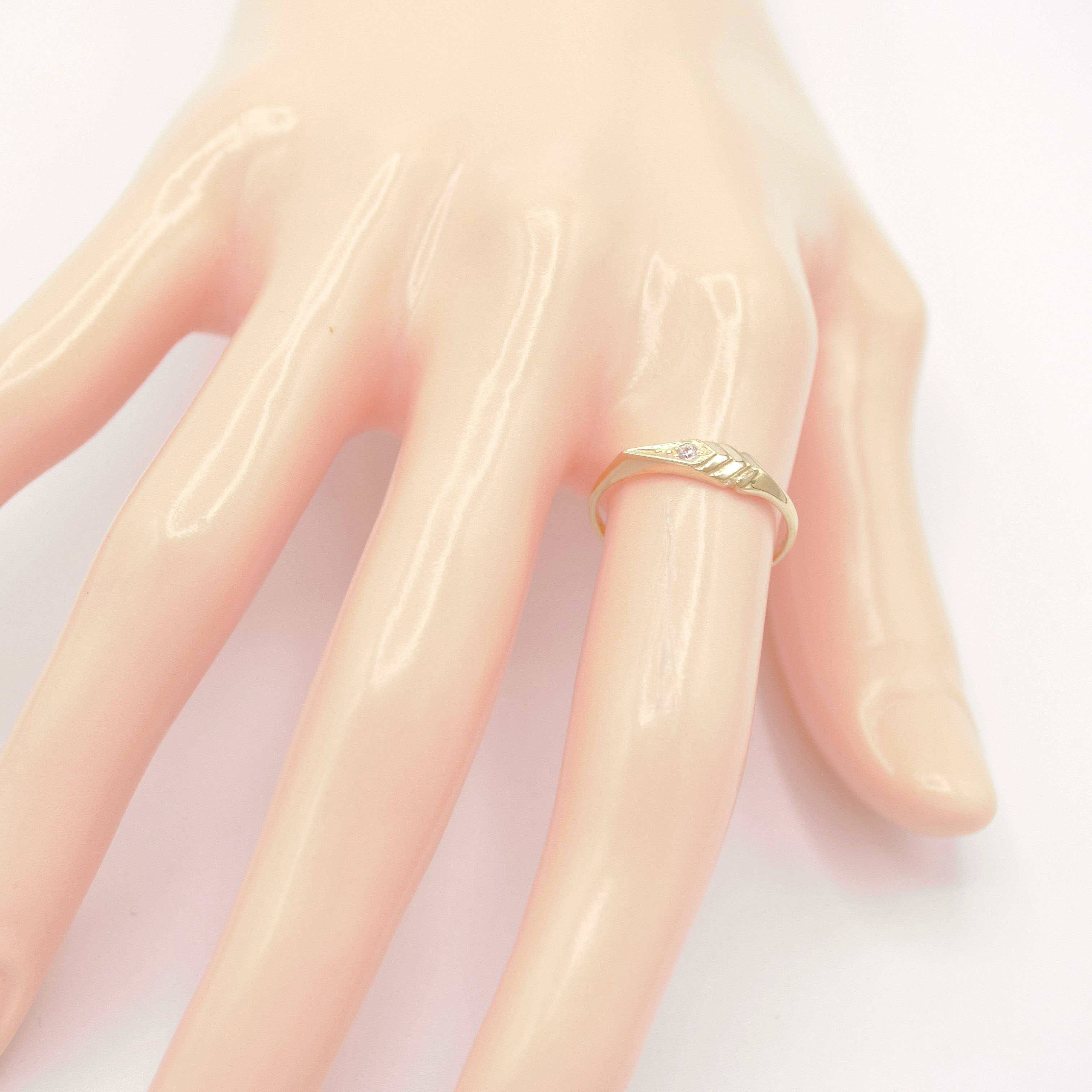 Zlatý prsten šipka se zirkonem 1,25g