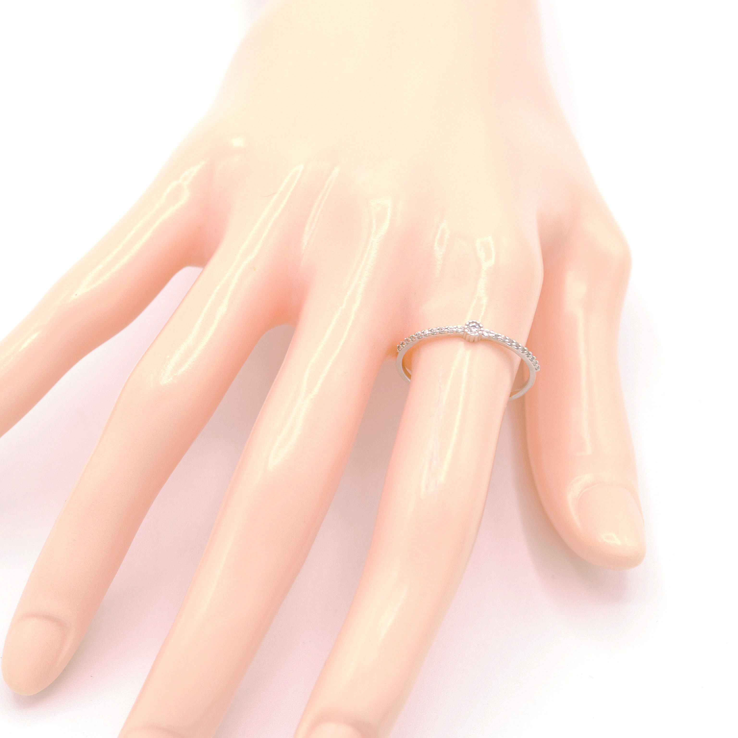 Prsten z bílého zlata, jemný se zirkony 1,00g