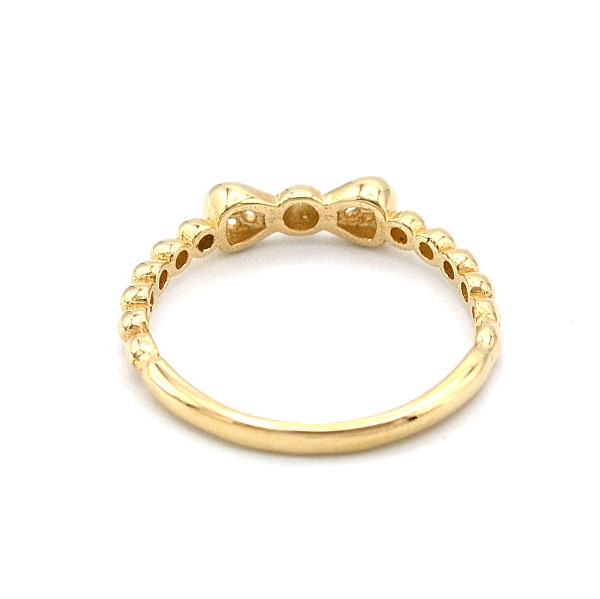 Zlatý prsten mašlička se zirkony 1,33g