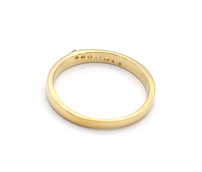 Zlatý prsten s šikmým pruhem zirkonů 1,30g