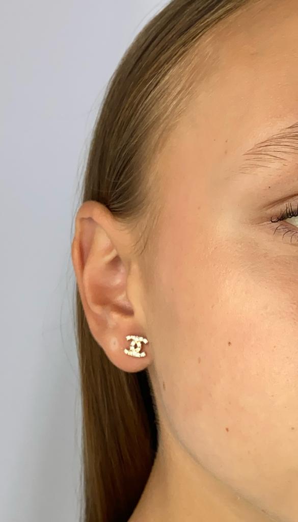 Zlaté náušnice znak se zirkony na puzetu 1,35g