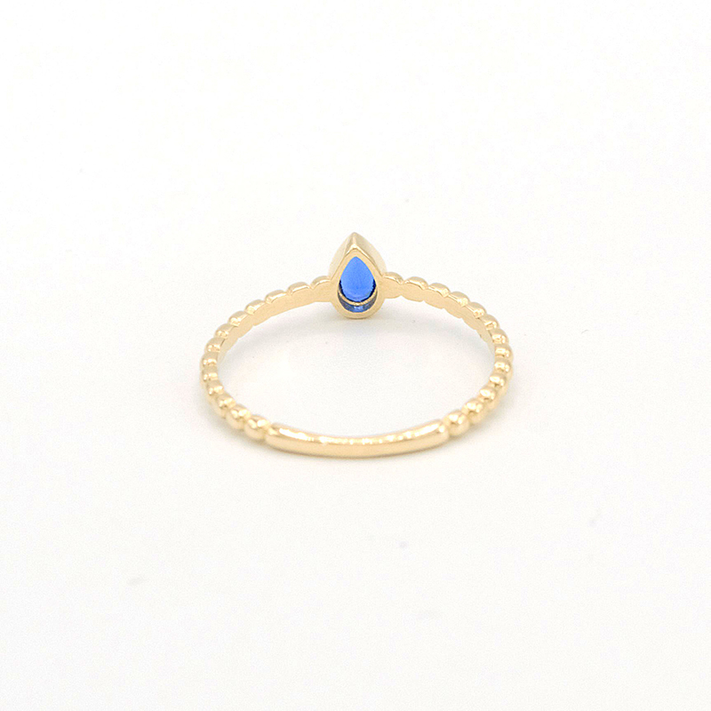 Zlatý prsten kapka s modrým kamínkem 1,20g