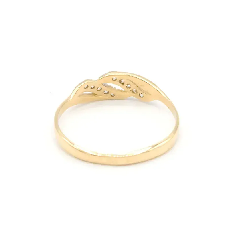 Zlatý prsten vlnky se zirkony dvě barvy zlata 1,33g 