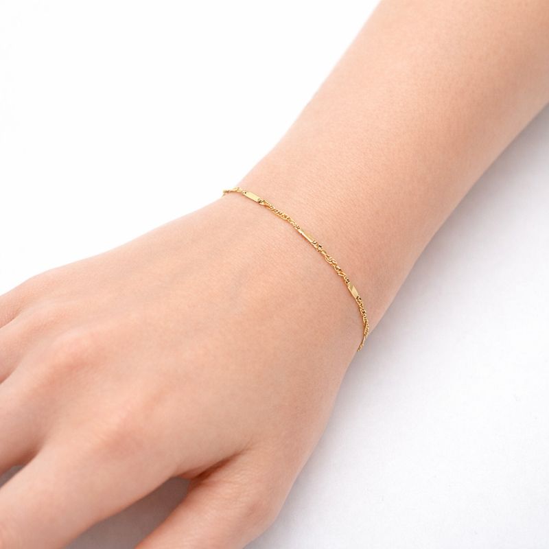 Zlatý náramek Singapore zdobený ploškami 0,80g