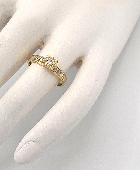 Zlatý zásnubní prsten se zirkony 1,95g