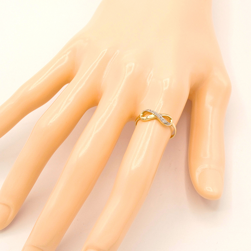 Zlatý prsten nekonečno se zirkony 1,30g