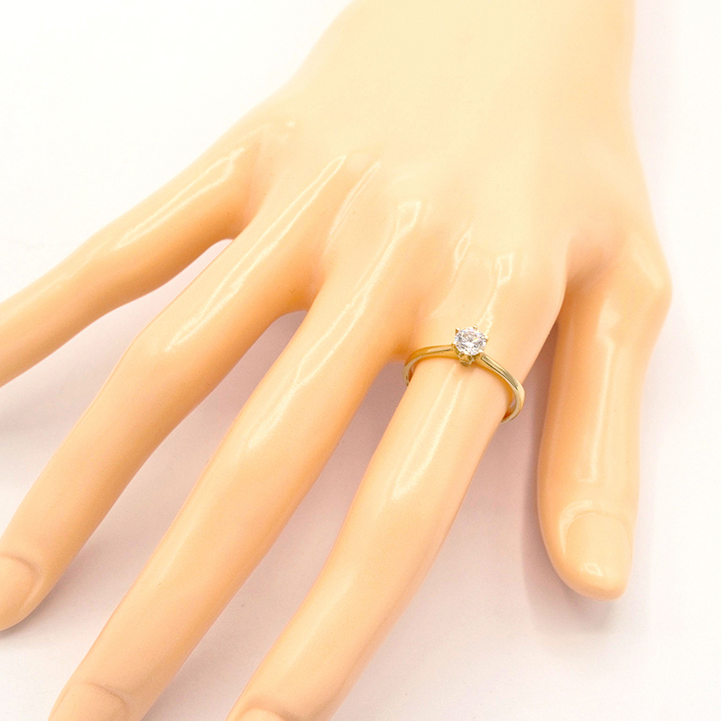 Zlatý zásnubní prsten s čirým zirkonem 1,70g