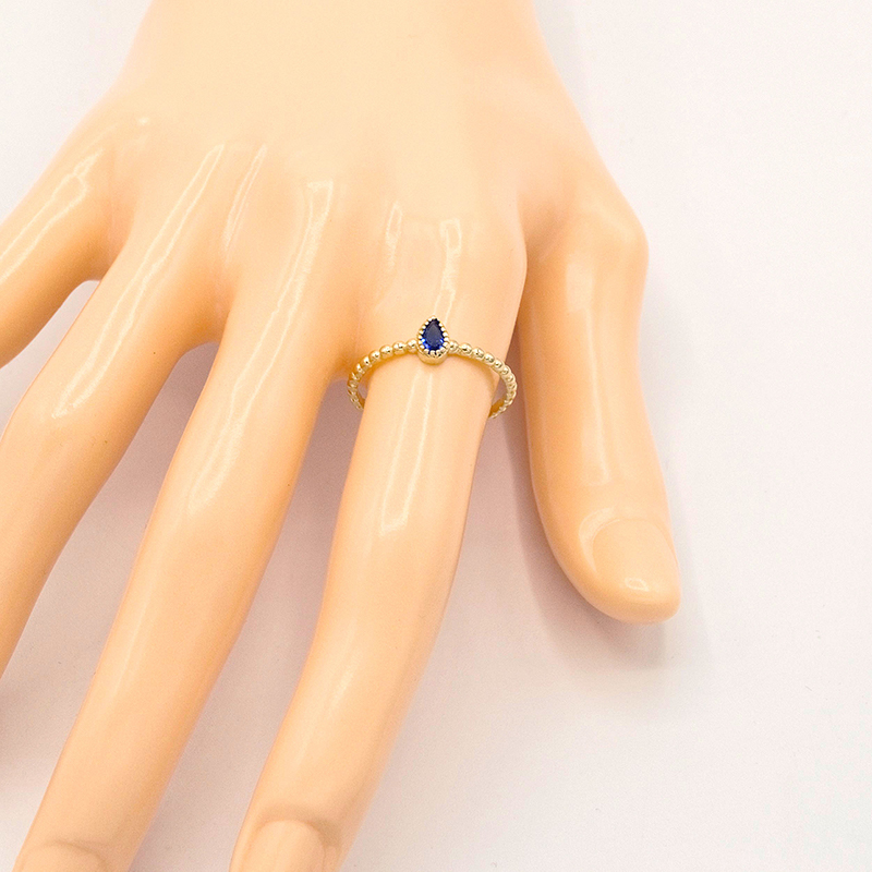 Zlatý prsten kapka s modrým kamínkem 1,20g