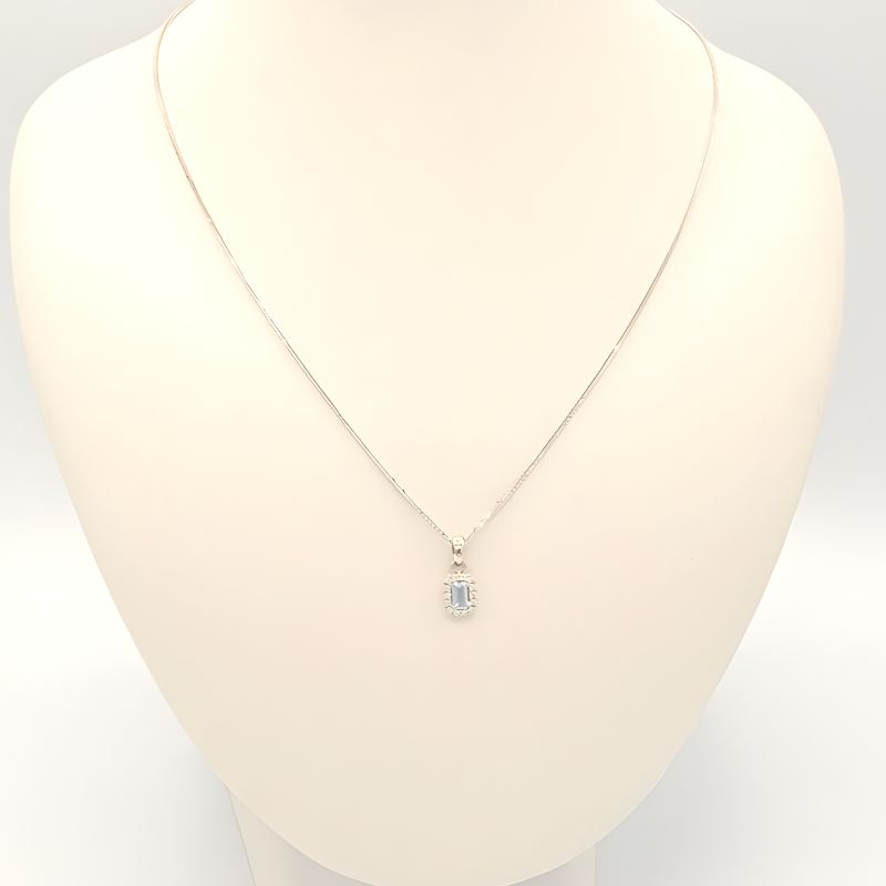 Přívěsek z bílého zlata, s topazem a zirkony 0,50g