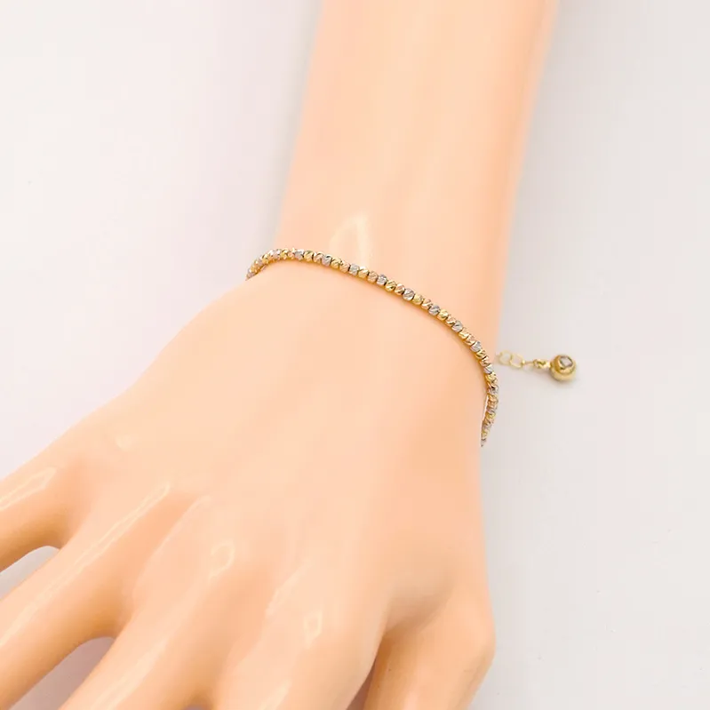 Zlatý náramek z lesklých kuliček tři barvy zlata 3,08g