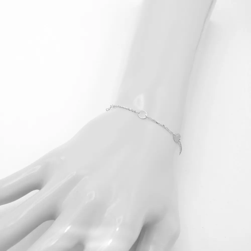 Náramek bílé zlato zdobený kolečky 1,25g