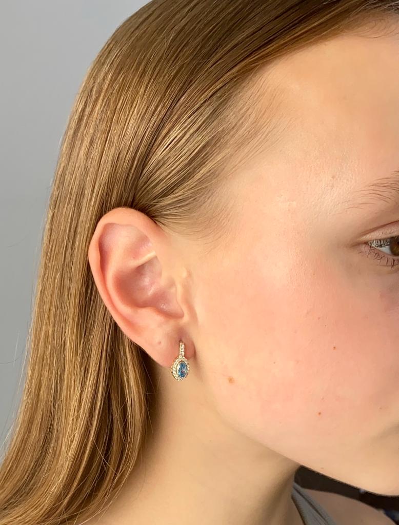 Zlaté náušnice s modrým kamenem a zirkony 2,55g