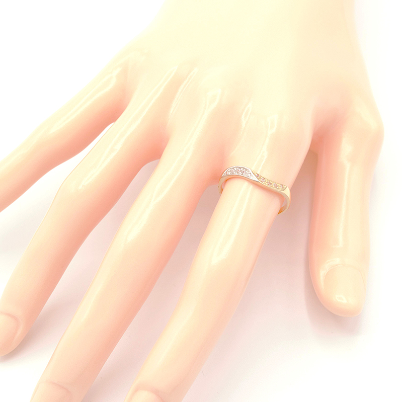 Zlatý prsten vlnky se zirkony dvě barvy zlata 1,17g 