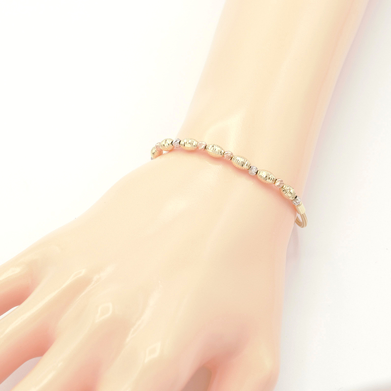 Zlatý náramek lanko s kuličkami a válečky tři barvy zlata 4,35g 