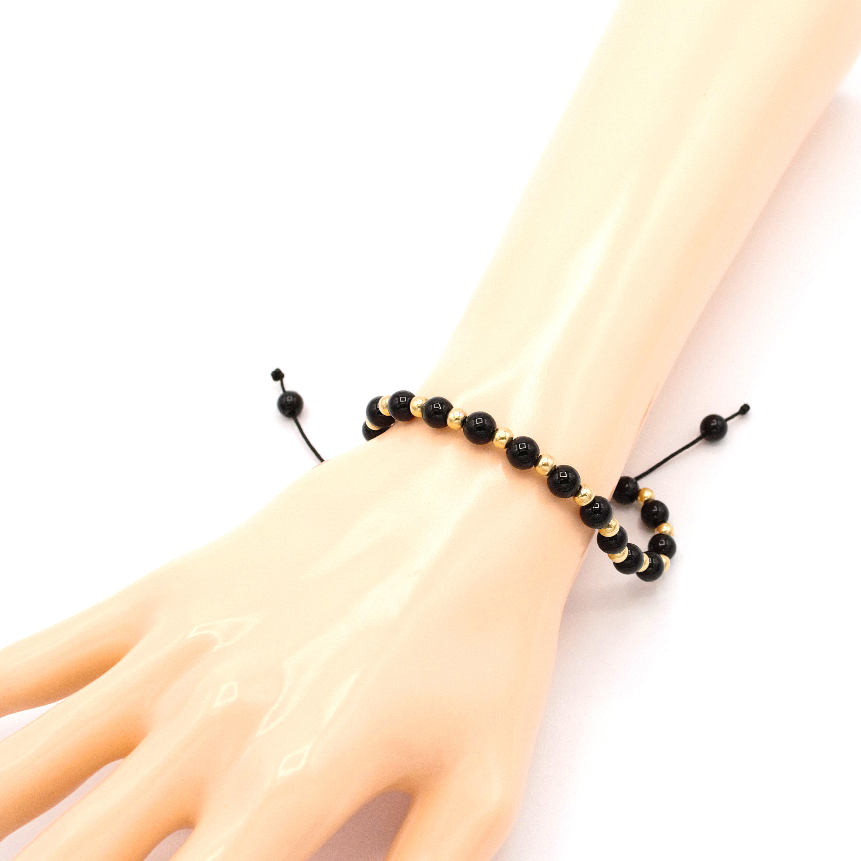 Náramek provázkový černý ze zlatých a černých kuliček 9,00g