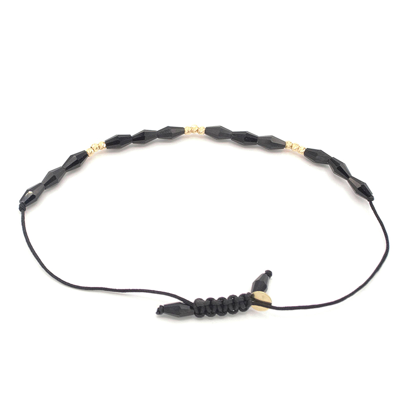 Provázkový náramek černý zdobený černými korálky a zlatými kuličkami 