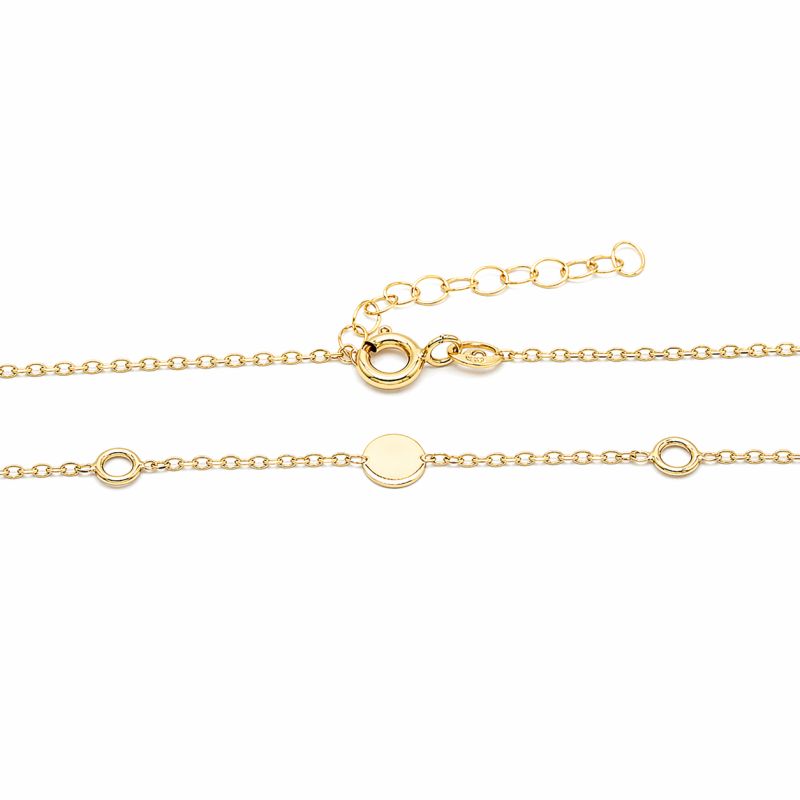 Zlatý řetízek zdobený kolečky 