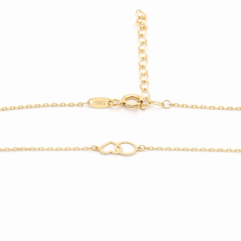 Zlatý řetízek s přívěsky tvaru srdce a kolečka 