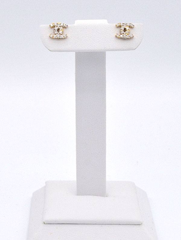 Zlaté náušnice znak se zirkony na puzetu 1,35g