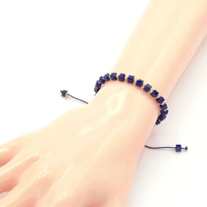 Náramek modrý provázek s modrými kostičkami a zlatými kuličkami 